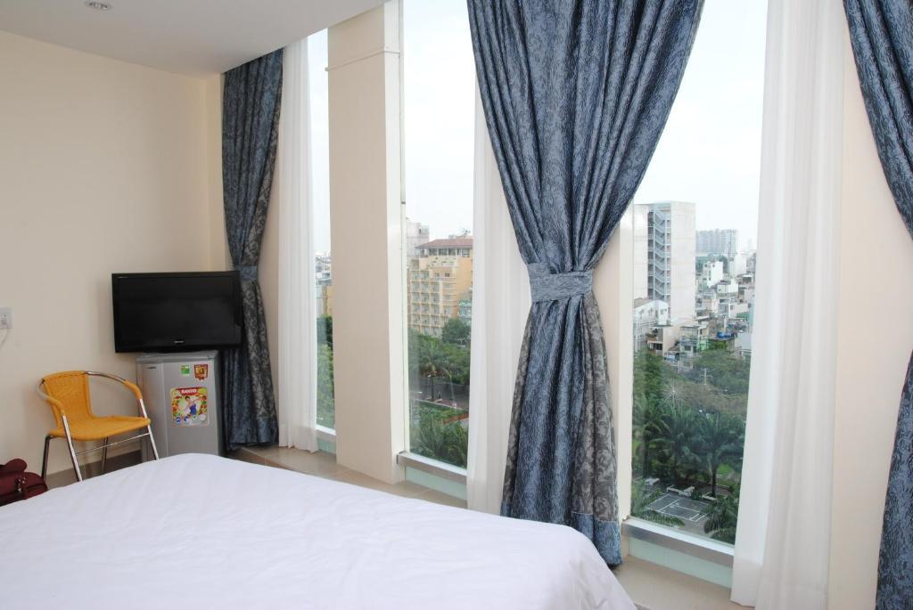 Vietnam Backpacker Hostels - Saigon Хошимин Стая снимка